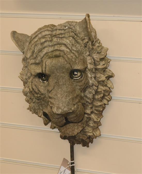 A tiger face garden ornament W.27cm